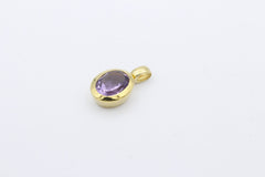 Schöner schlichter Anhänger aus 333 / 8 Karat Gelbgold mit ein Amethyst