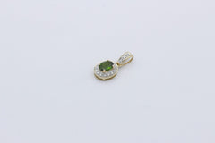 Schöner Damen Anhänger aus 375/9k Gelbgold mit ein Turmalin & Diamanten