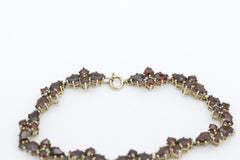 Wunderschöner Damen Armband aus 333 / 8k Gelbgold mit Granat Edelsteine