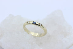 Zarter Damen Juwelen Ring aus 333 / 8k Gelbgold mit ein Saphir & Brillanten