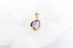 Schöner schlichter Anhänger aus 333 / 8 Karat Gelbgold mit ein Amethyst
