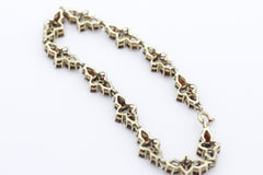 Wunderschöner Damen Armband aus 333 / 8k Gelbgold mit Granat Edelsteine