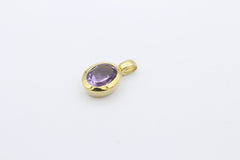 Schöner schlichter Anhänger aus 333 / 8 Karat Gelbgold mit ein Amethyst