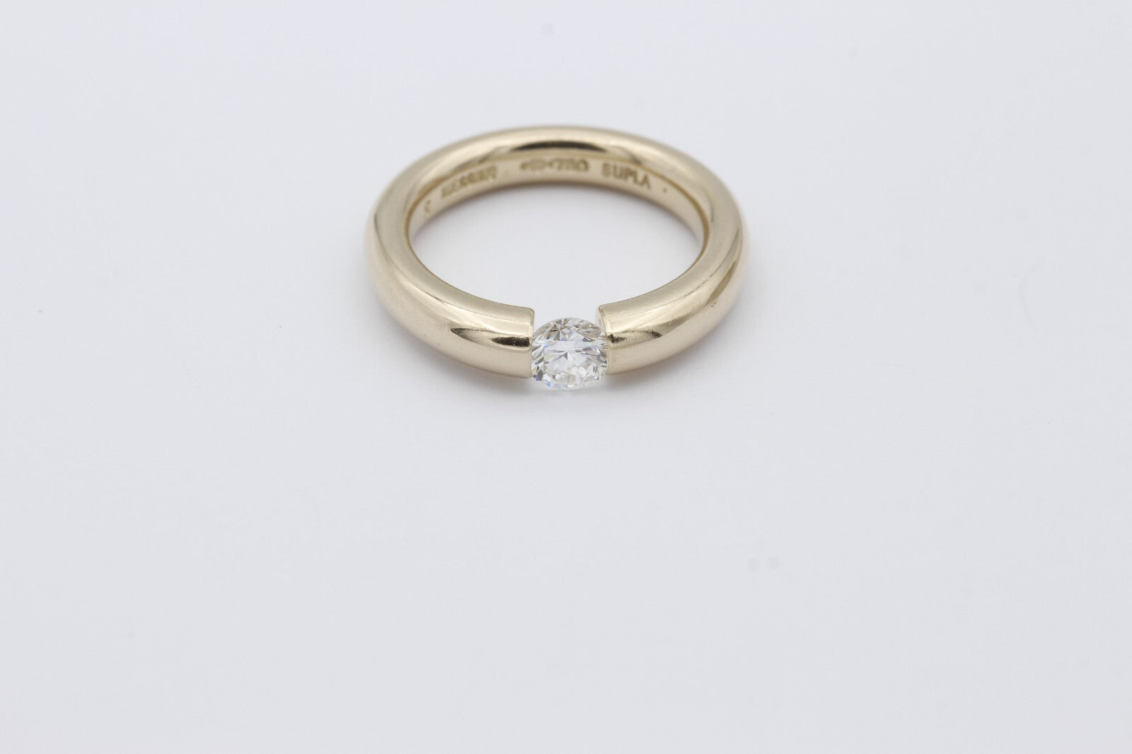 Niessing Spannring 750 / 18 Karat Gold Solitär Brillant ca. 0,45 ct.