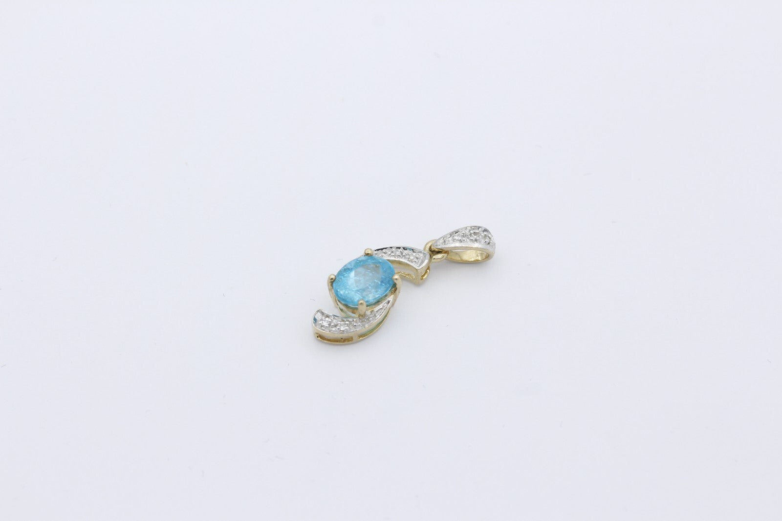 Juwelen Damen Anhänger aus 375 / 9k Gelbgold mit ein Topas & Diamanten
