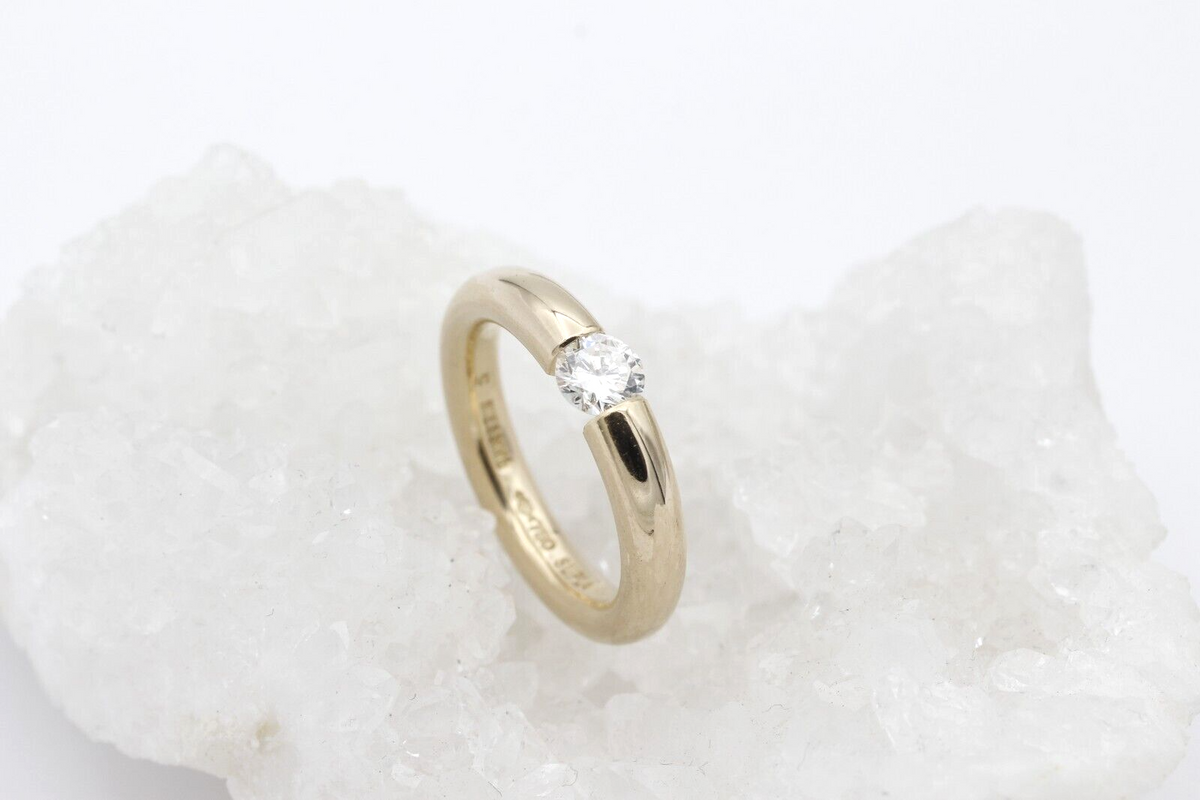Niessing Spannring 750 / 18 Karat Gold Solitär Brillant ca. 0,45 ct.