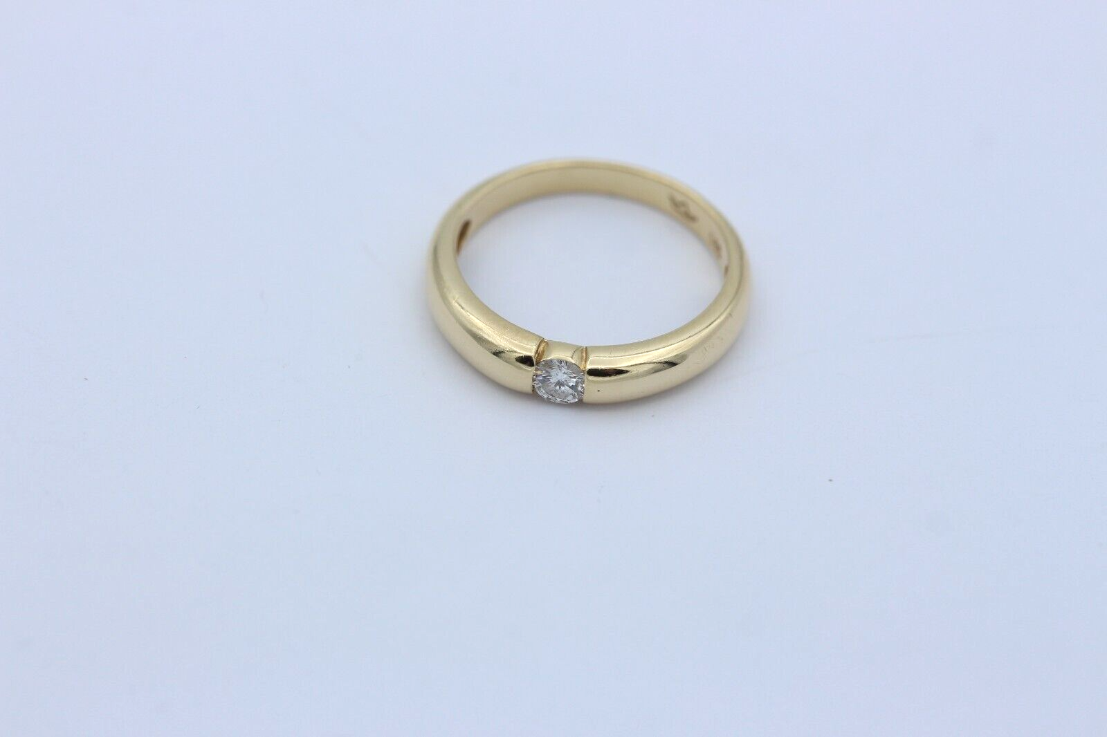 Exklusiver Solitär Spannring aus 585er / 14k Gelbgold mit ein Brillant 0,15 ct.