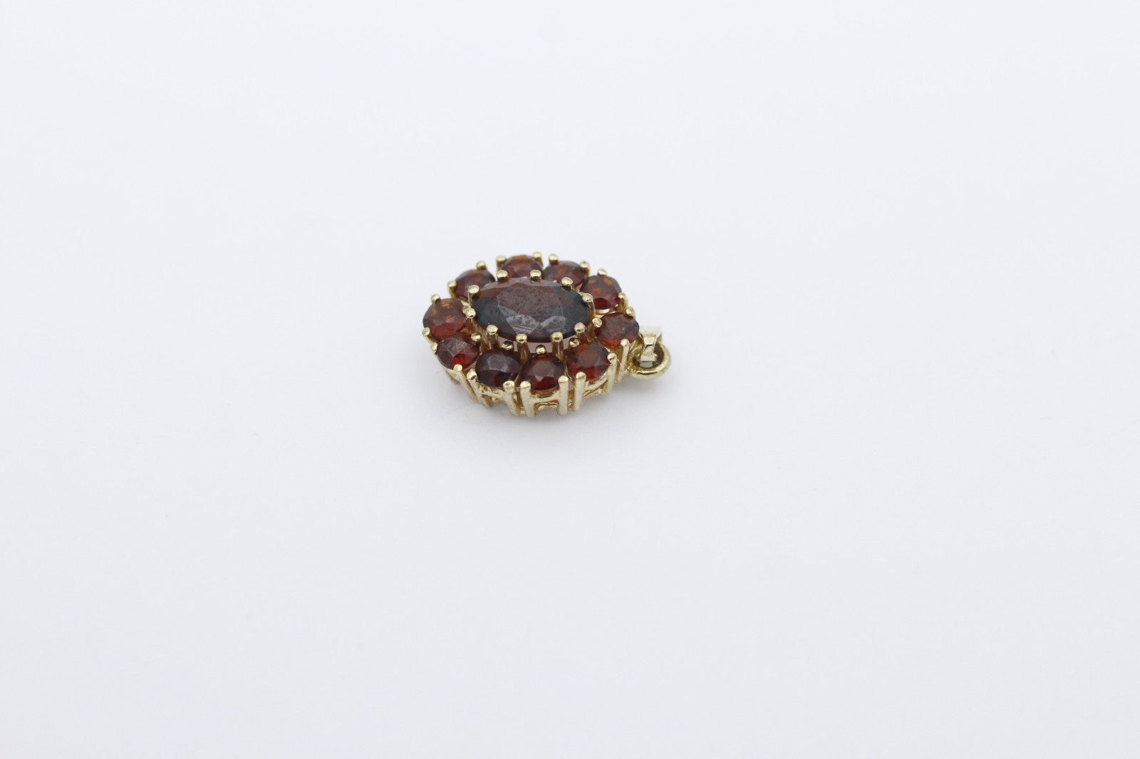 Wunderschöner Damen Anhänger aus 333 / 8k Gelbgold mit Granat Edelsteine