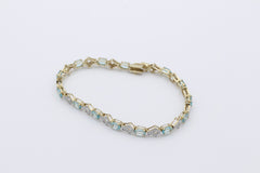 Wunderschöner Juwelen Armband aus 375 / 9k Gelbgold mit Edelsteine & Diamanten