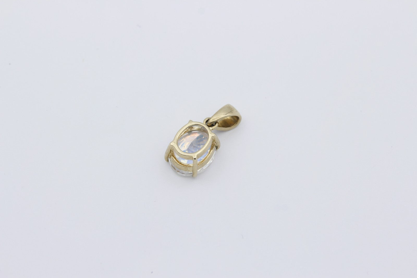 Damen Anhänger aus 375 / 9k Gelbgold mit ein Farbstein & Diamant