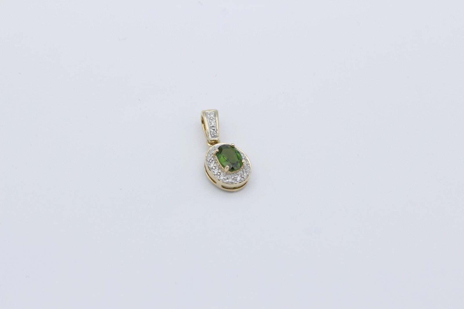 Schöner Damen Anhänger aus 375/9k Gelbgold mit ein Turmalin & Diamanten