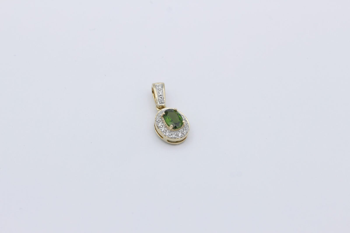 Schöner Damen Anhänger aus 375/9k Gelbgold mit ein Turmalin & Diamanten