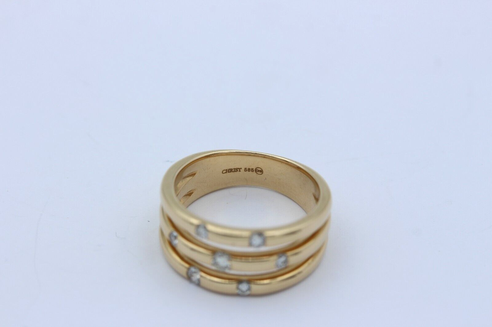 Christ Exklusiver Designer Damen Ring aus 585 / 14k Gelbgold mit 7 Diamanten