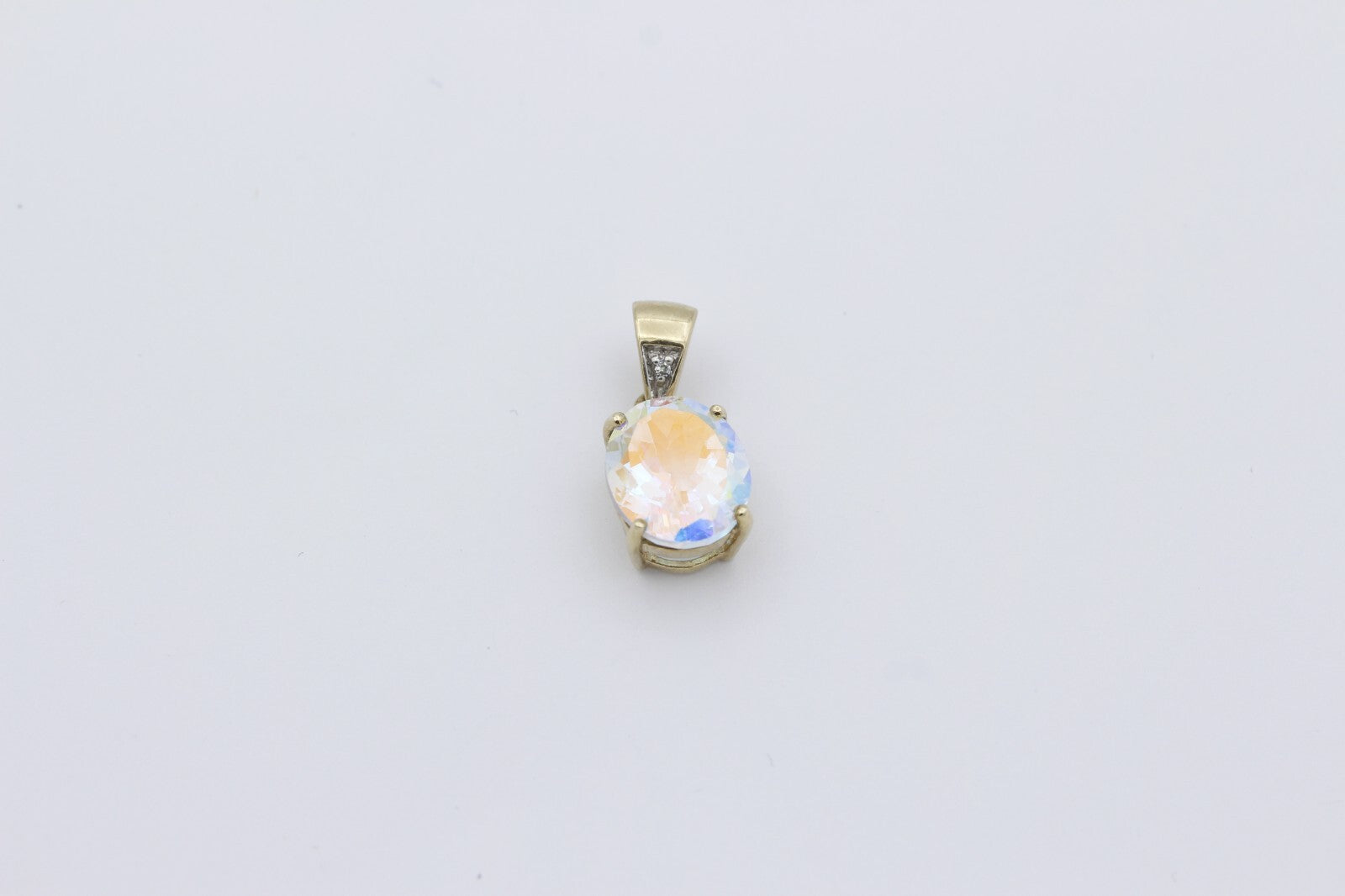 Damen Anhänger aus 375 / 9k Gelbgold mit ein Farbstein & Diamant