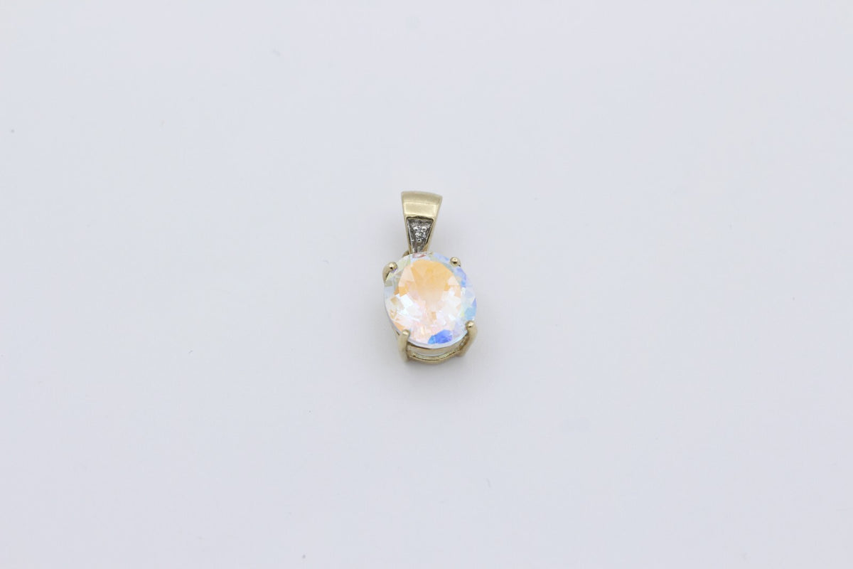 Damen Anhänger aus 375 / 9k Gelbgold mit ein Farbstein & Diamant