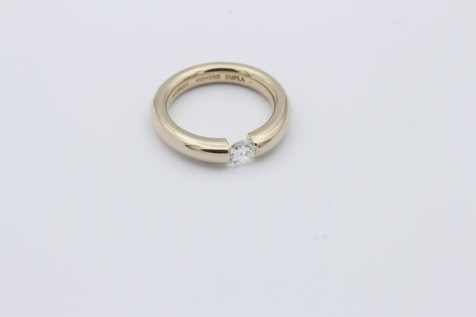 Niessing Spannring 750 / 18 Karat Gold Solitär Brillant ca. 0,45 ct.