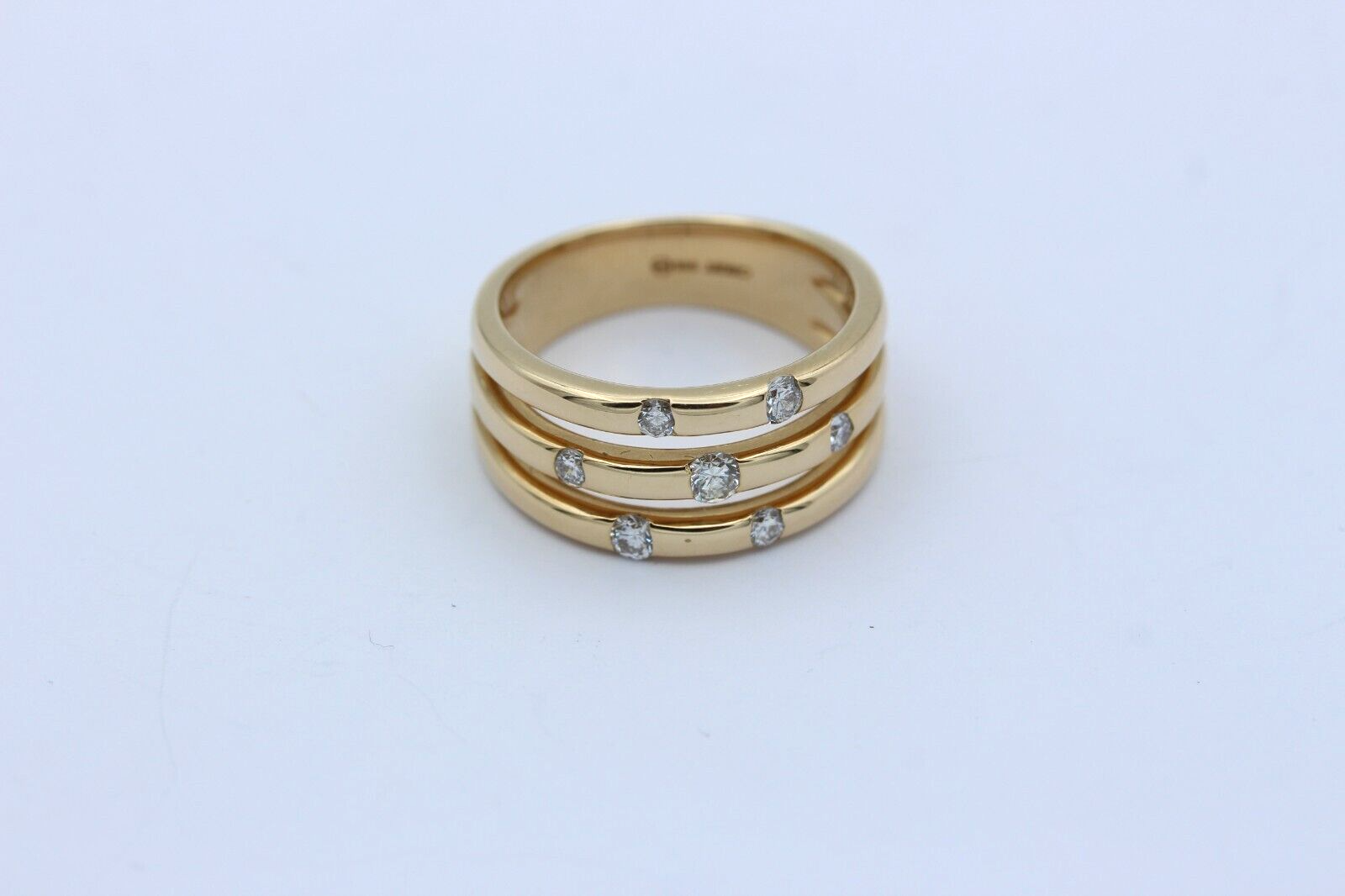 Christ Exklusiver Designer Damen Ring aus 585 / 14k Gelbgold mit 7 Diamanten