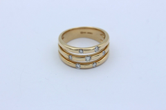 Christ Exklusiver Designer Damen Ring aus 585 / 14k Gelbgold mit 7 Diamanten