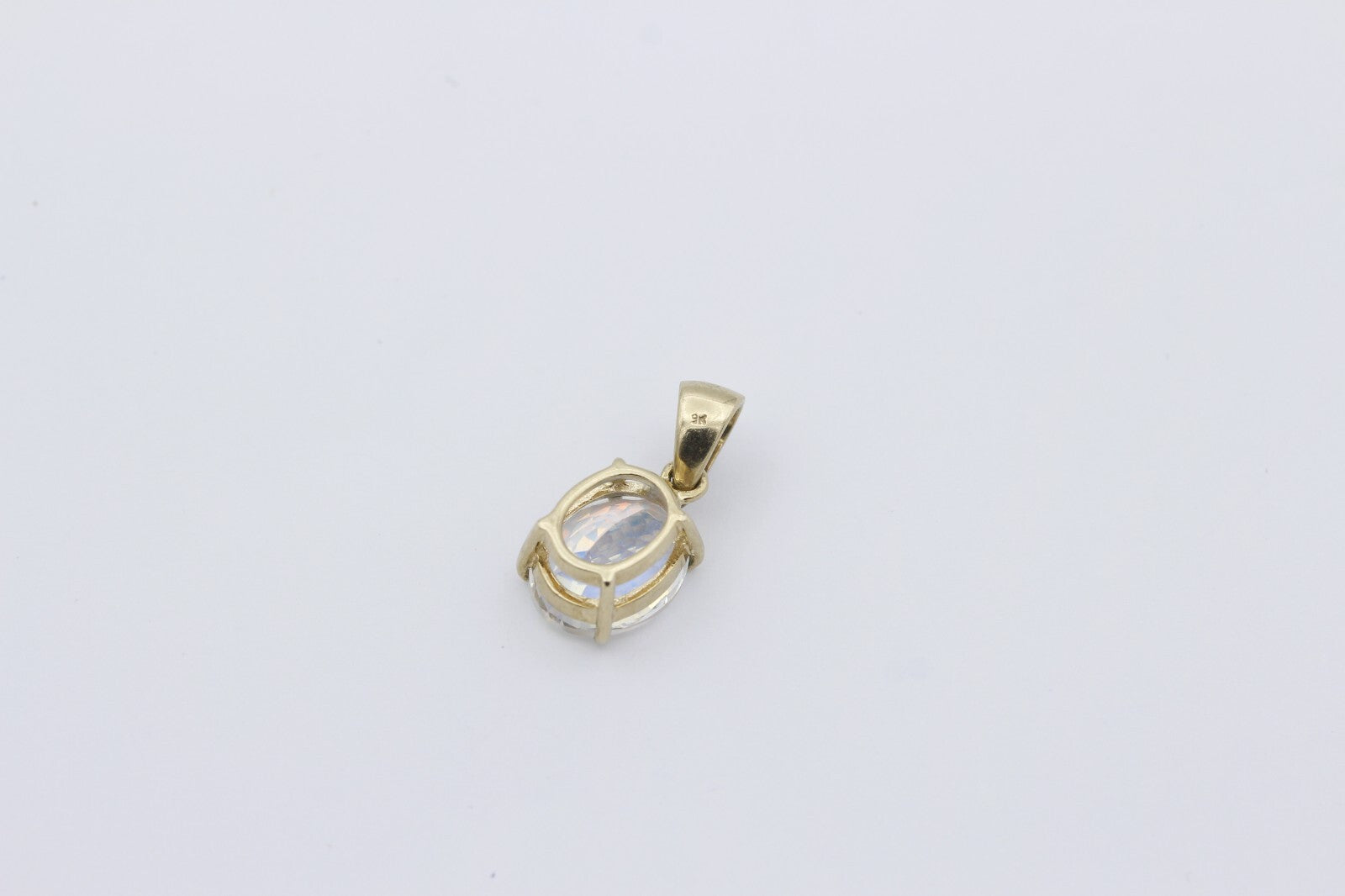 Damen Anhänger aus 375 / 9k Gelbgold mit ein Farbstein & Diamant