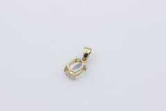 Damen Anhänger aus 375 / 9k Gelbgold mit ein Farbstein & Diamant