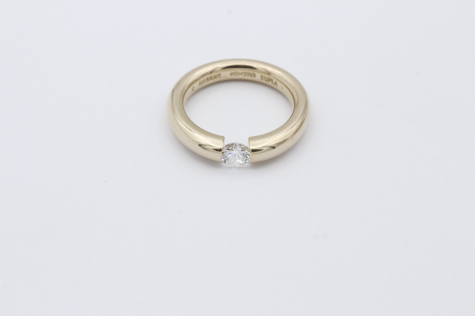 Niessing Spannring 750 / 18 Karat Gold Solitär Brillant ca. 0,45 ct.